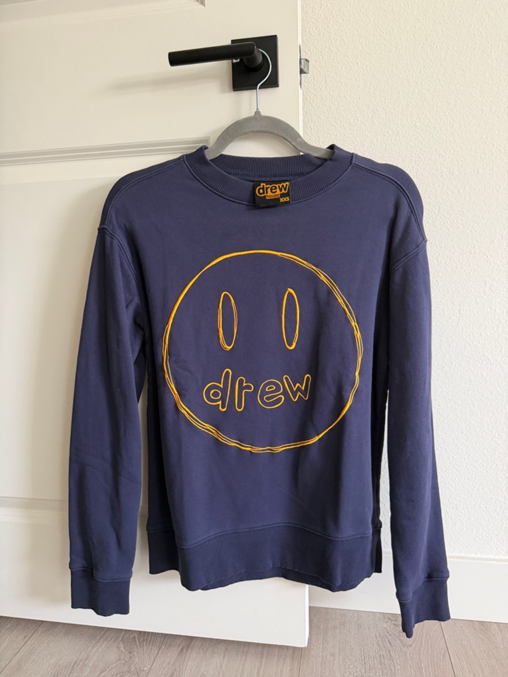 drew house navy blue crewneck sweater with yellow smile logo
